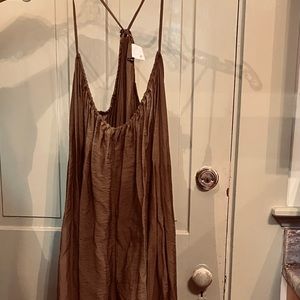Boho olive green wide-legged Akemi + Kim romper from Anthropologie